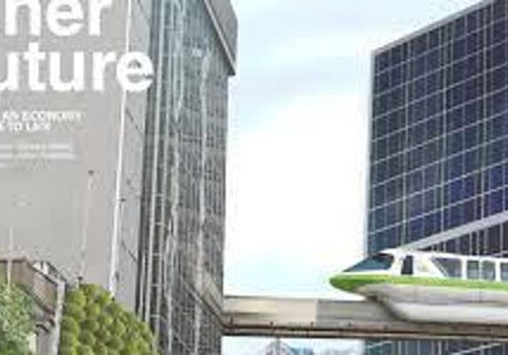 Monorail passing through modern cityscape with greenery.